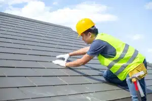 Performance Roofing and Siding residential roofing contractors doing a roof inspection in in Pontiac, MI