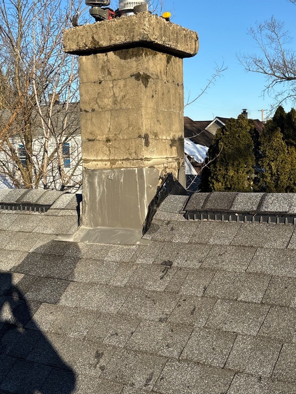 Sealed and weatherproof chimney flashing after repair