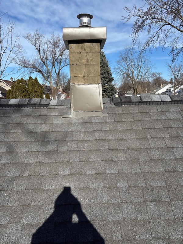 Newly installed chimney flashing to prevent water damage