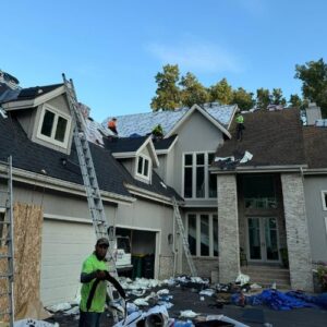 Performance Roofing and Siding residential roofing contractors in Michigan that is in the process of roof replacement.
