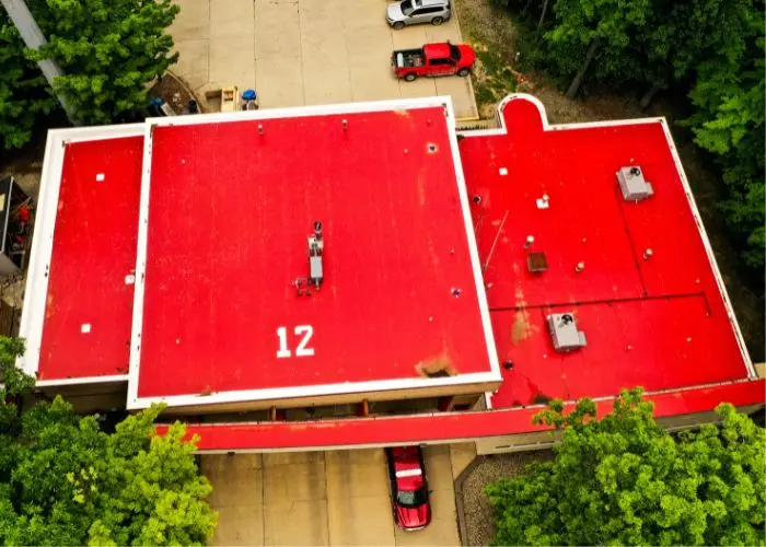Certified Crew Installation of Commercial Flat Roof by Performance Roofing & Siding