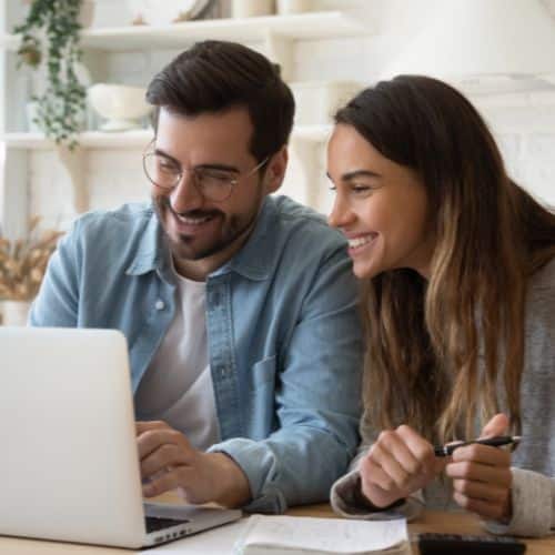 Homeowners inquiring about financing from Performance Roofing and Siding