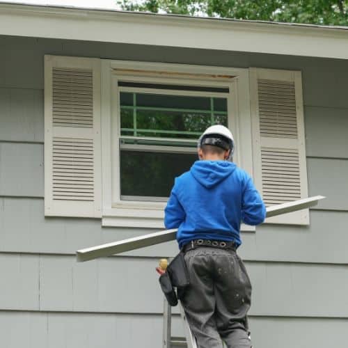 Siding and exterior trim installation on a home in Michigan.