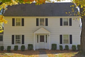 Black is the best color for roof shingles for a white house